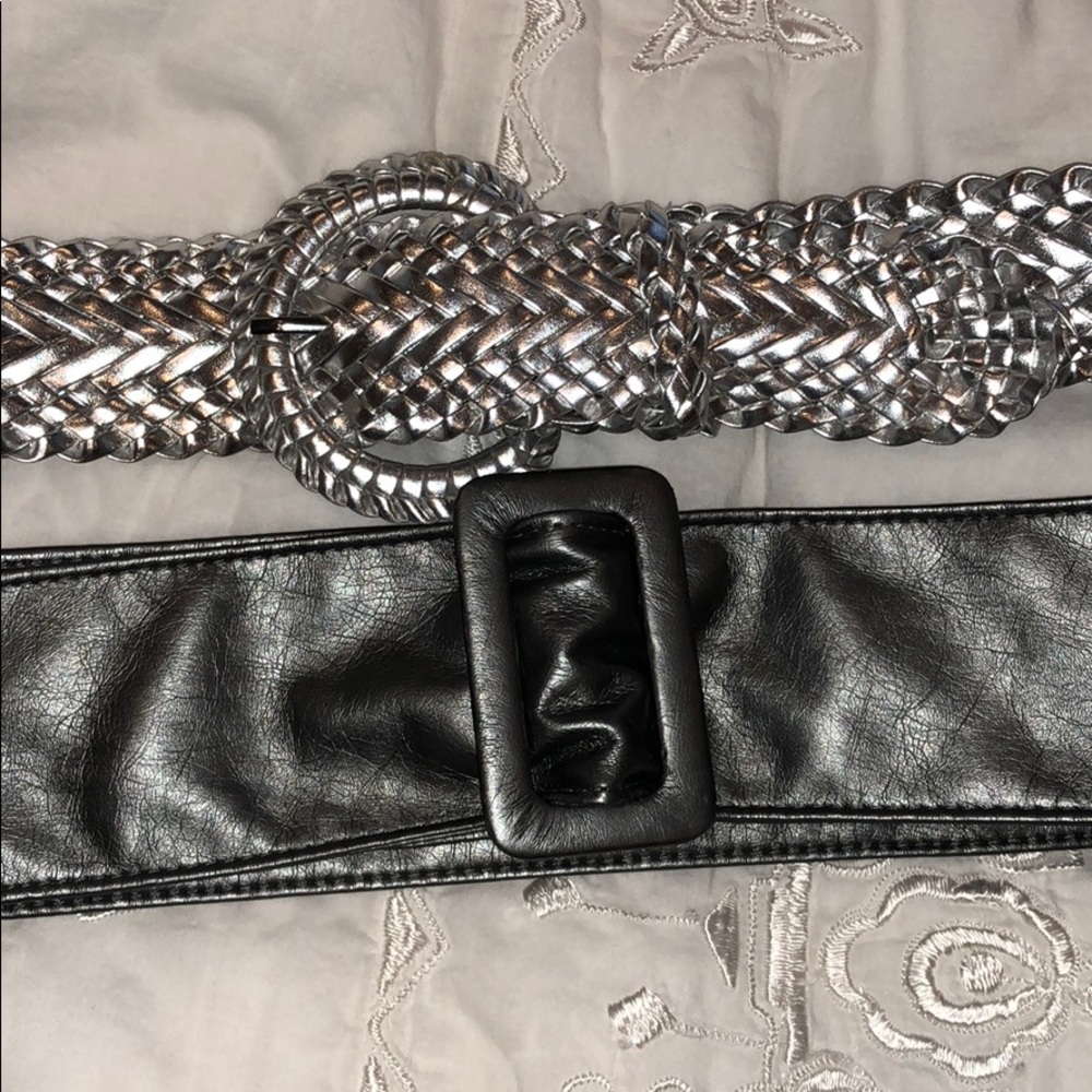 2 silver/gray belts. Excellent condition. Medium